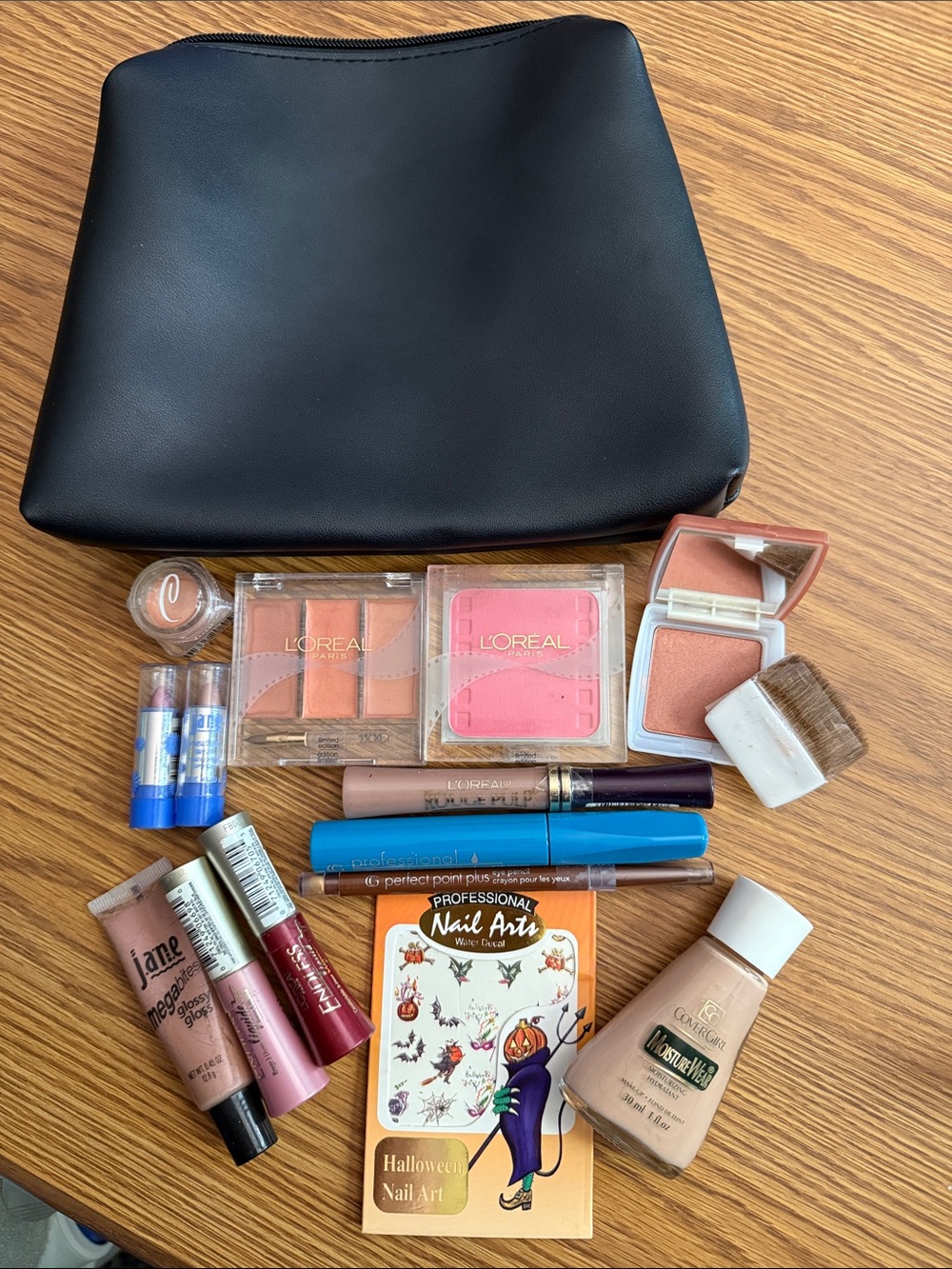 Women Makeup Essentials Set in Peach & Pink Shades in a black sleek travel bag